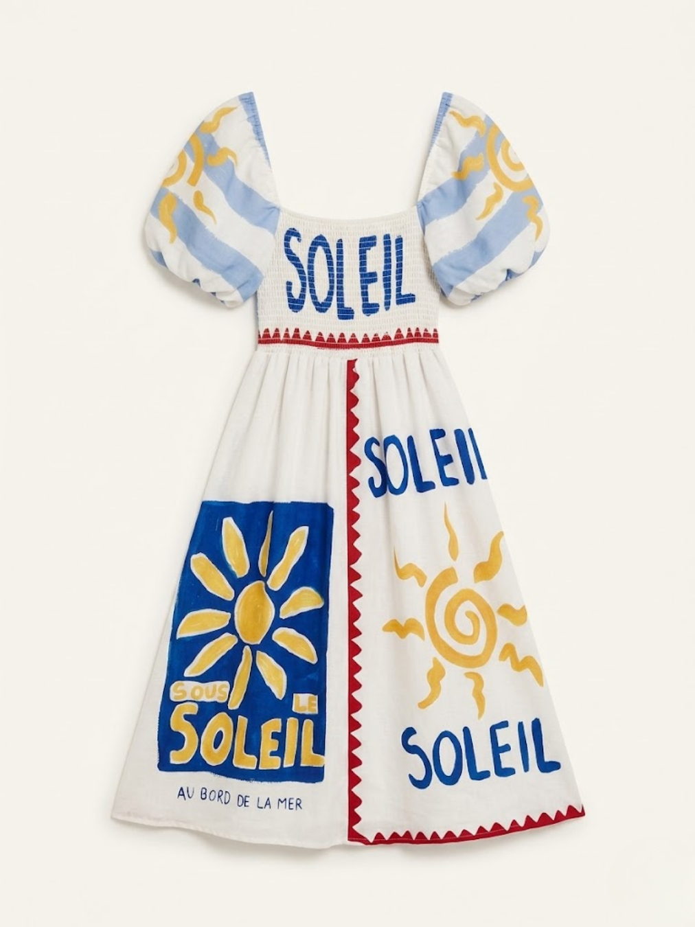 Parte posterior del vestido con estampados de soles amarillos y el texto "Sous le soleil".