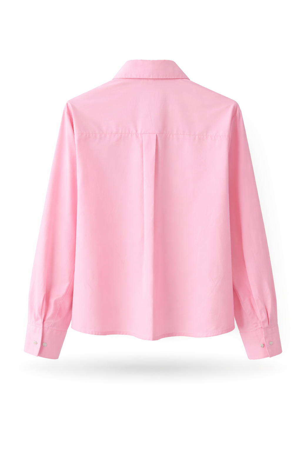 Parte de atrás de la camisa rosa pastel en tejido de algodón transpirable.