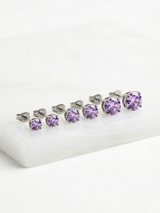 Set de pendientes lavanda con brillo de circonita en tres medidas progresivas.