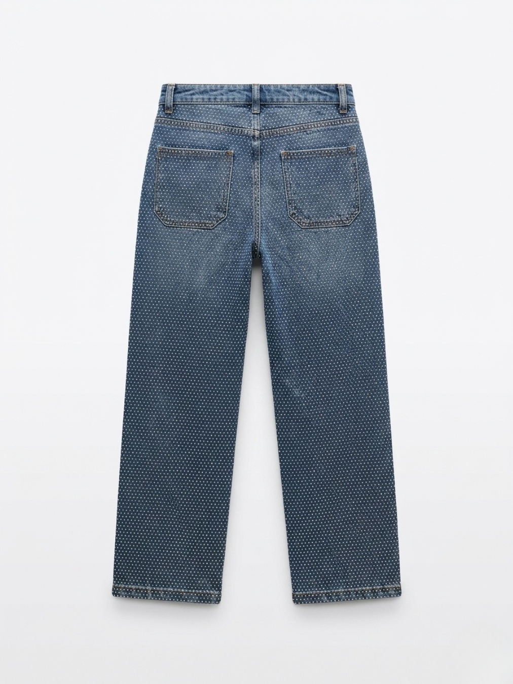 Vista trasera de vaqueros Wide Leg azules con diamantitos salpicados y bolsillos traseros.